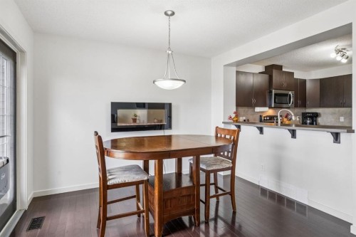 150 River Heights Crescent, Cochrane, AB - Indoor With Fireplace