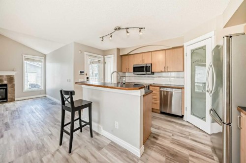 168 Tuscany Springs Way Nw, Calgary, AB - Indoor Photo Showing Kitchen With Stainless Steel Kitchen