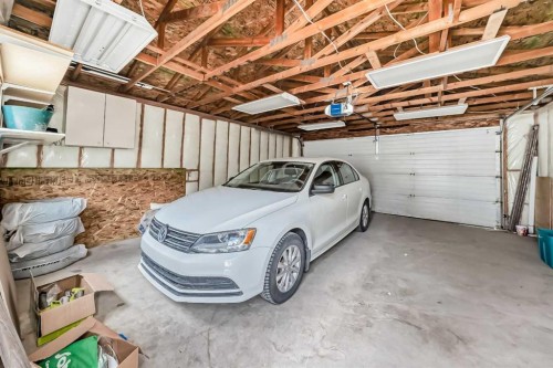 168 Tuscany Springs Way Nw, Calgary, AB - Indoor Photo Showing Garage