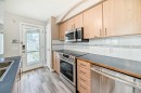 168 Tuscany Springs Way Nw, Calgary, AB  - Indoor Photo Showing Kitchen With Stainless Steel Kitchen 