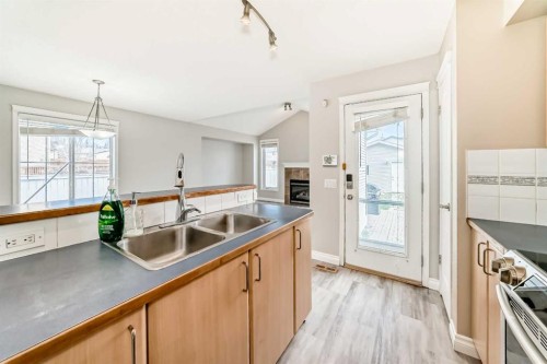 168 Tuscany Springs Way Nw, Calgary, AB - Indoor Photo Showing Kitchen With Double Sink