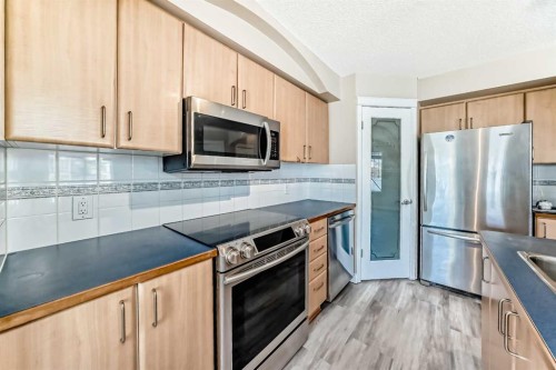 168 Tuscany Springs Way Nw, Calgary, AB - Indoor Photo Showing Kitchen With Stainless Steel Kitchen