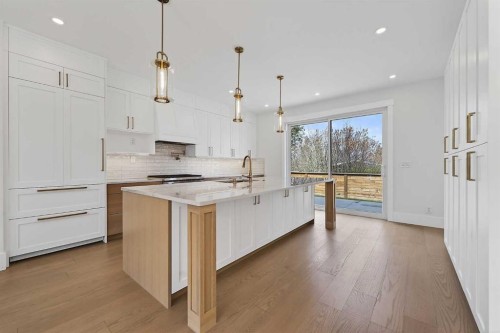88 Woodlark Drive Sw, Calgary, AB - Indoor Photo Showing Kitchen With Upgraded Kitchen