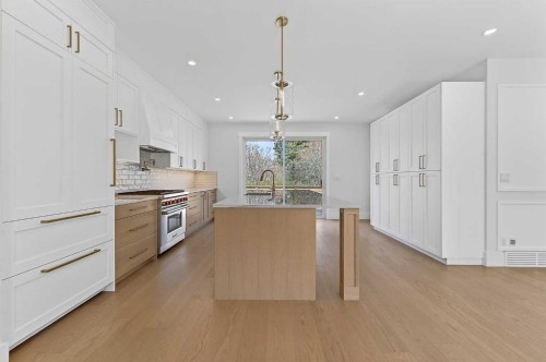 88 Woodlark Drive Sw, Calgary, AB - Indoor Photo Showing Kitchen With Upgraded Kitchen