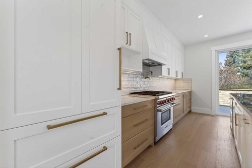 88 Woodlark Drive Sw, Calgary, AB - Indoor Photo Showing Kitchen With Upgraded Kitchen