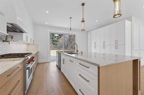 88 Woodlark Drive Sw, Calgary, AB - Indoor Photo Showing Kitchen With Upgraded Kitchen