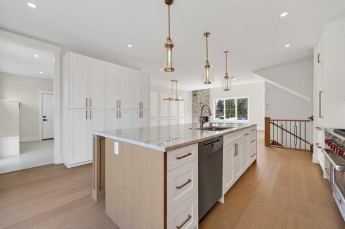 88 Woodlark Drive Sw, Calgary, AB - Indoor Photo Showing Kitchen With Upgraded Kitchen
