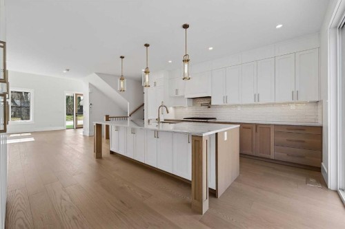 88 Woodlark Drive Sw, Calgary, AB - Indoor Photo Showing Kitchen With Upgraded Kitchen