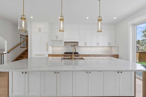 88 Woodlark Drive Sw, Calgary, AB - Indoor Photo Showing Kitchen With Upgraded Kitchen