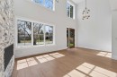 88 Woodlark Drive Sw, Calgary, AB  - Indoor Photo Showing Other Room With Fireplace 