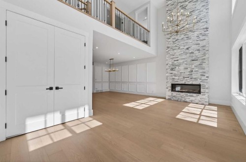 88 Woodlark Drive Sw, Calgary, AB - Indoor With Fireplace