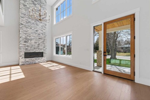 88 Woodlark Drive Sw, Calgary, AB - Indoor With Fireplace