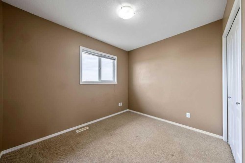 108 Sunrise Terrace Ne, High River, AB - Indoor Photo Showing Other Room
