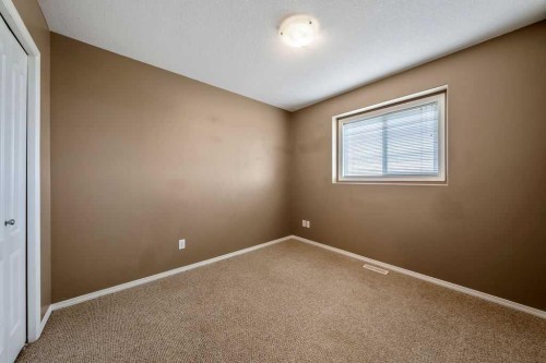 108 Sunrise Terrace Ne, High River, AB - Indoor Photo Showing Other Room