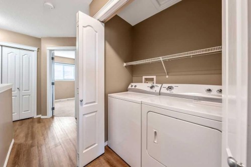 108 Sunrise Terrace Ne, High River, AB - Indoor Photo Showing Laundry Room
