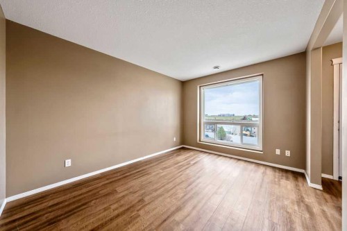 108 Sunrise Terrace Ne, High River, AB - Indoor Photo Showing Other Room