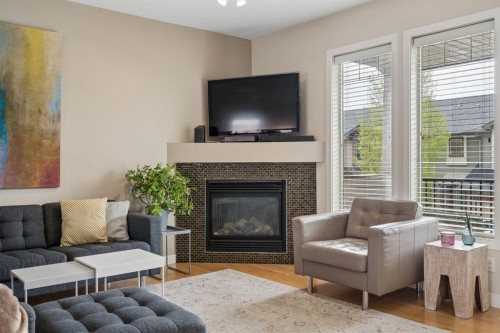 614-413 River Avenue, Cochrane, AB - Indoor Photo Showing Living Room With Fireplace