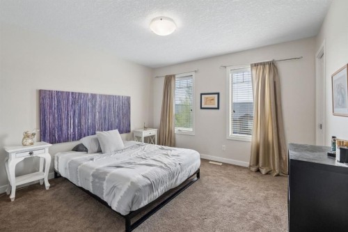 614-413 River Avenue, Cochrane, AB - Indoor Photo Showing Bedroom