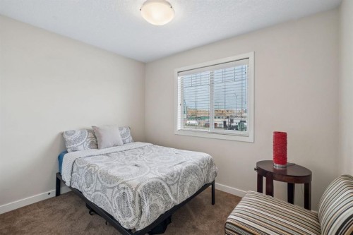 614-413 River Avenue, Cochrane, AB - Indoor Photo Showing Bedroom