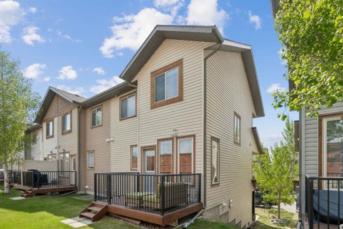 614-413 River Avenue, Cochrane, AB - Outdoor With Deck Patio Veranda With Exterior