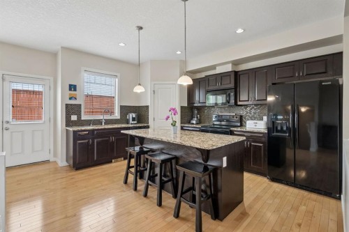 614-413 River Avenue, Cochrane, AB - Indoor Photo Showing Kitchen With Upgraded Kitchen