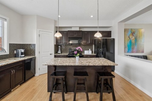 614-413 River Avenue, Cochrane, AB - Indoor Photo Showing Kitchen With Upgraded Kitchen