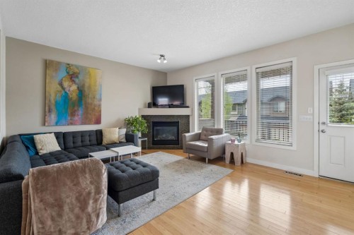 614-413 River Avenue, Cochrane, AB - Indoor Photo Showing Living Room With Fireplace