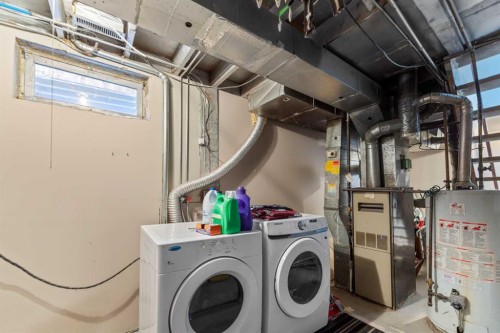 40 Pinecliff Close Ne, Calgary, AB - Indoor Photo Showing Laundry Room