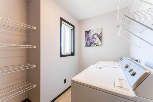 277 Panora Way Nw, Calgary, AB - Indoor Photo Showing Laundry Room