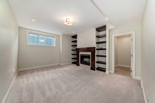 60 Hong Kong Road Sw, Calgary, AB - Indoor With Fireplace