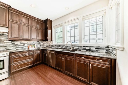 60 Hong Kong Road Sw, Calgary, AB - Indoor Photo Showing Kitchen With Double Sink