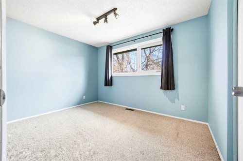 103 Thorson Crescent, Okotoks, AB - Indoor Photo Showing Other Room
