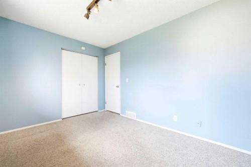 103 Thorson Crescent, Okotoks, AB - Indoor Photo Showing Other Room