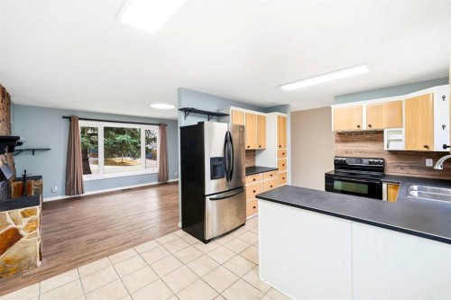 103 Thorson Crescent, Okotoks, AB - Indoor Photo Showing Kitchen