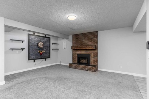 36 Bearberry Crescent Nw, Calgary, AB - Indoor With Fireplace