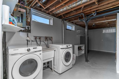 36 Bearberry Crescent Nw, Calgary, AB - Indoor Photo Showing Laundry Room