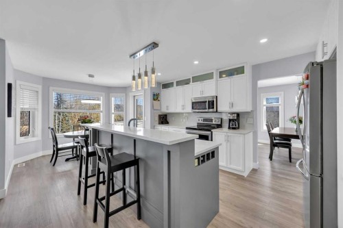 147 Hawkmere View, Chestermere, AB - Indoor Photo Showing Kitchen With Stainless Steel Kitchen With Upgraded Kitchen
