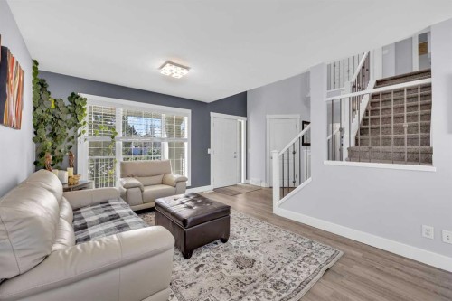 147 Hawkmere View, Chestermere, AB - Indoor Photo Showing Living Room