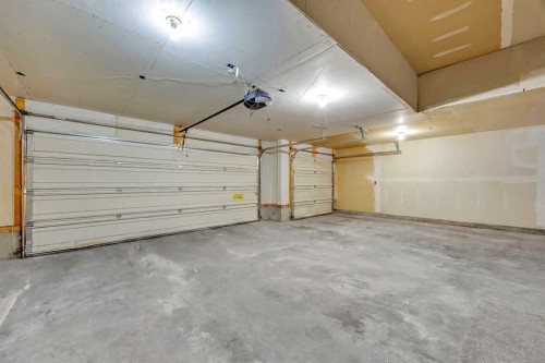 147 Hawkmere View, Chestermere, AB - Indoor Photo Showing Garage