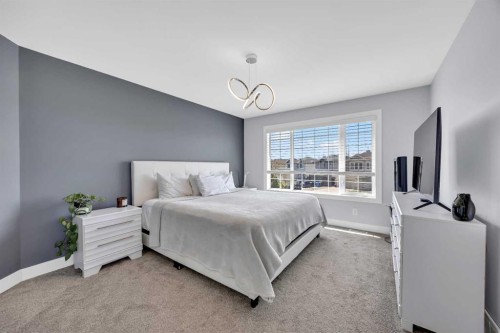 147 Hawkmere View, Chestermere, AB - Indoor Photo Showing Bedroom