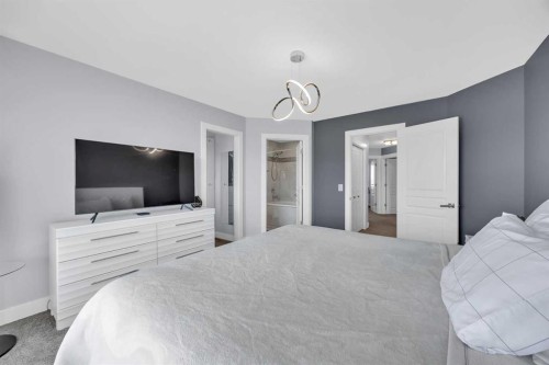 147 Hawkmere View, Chestermere, AB - Indoor Photo Showing Bedroom