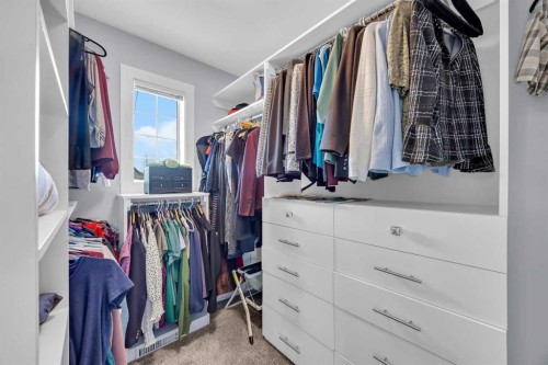 147 Hawkmere View, Chestermere, AB - Indoor With Storage