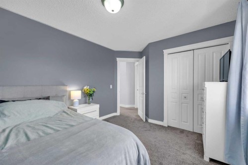 147 Hawkmere View, Chestermere, AB - Indoor Photo Showing Bedroom