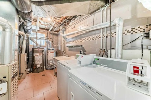 604 69 Avenue Sw, Calgary, AB - Indoor Photo Showing Laundry Room