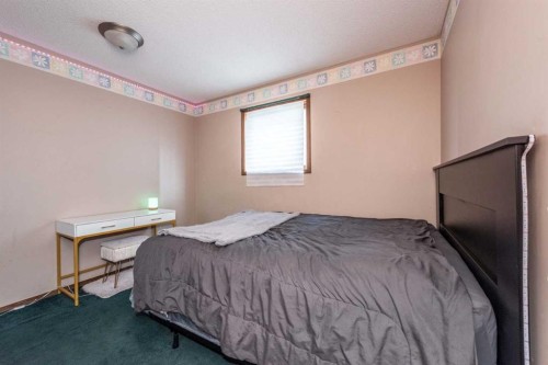 27 Ventura Way Ne, Calgary, AB - Indoor Photo Showing Bedroom