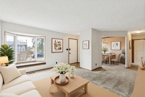 145 Alpine Crescent Se, Airdrie, AB - Indoor Photo Showing Living Room