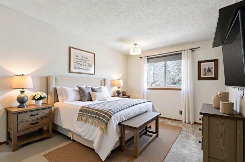 145 Alpine Crescent Se, Airdrie, AB - Indoor Photo Showing Bedroom