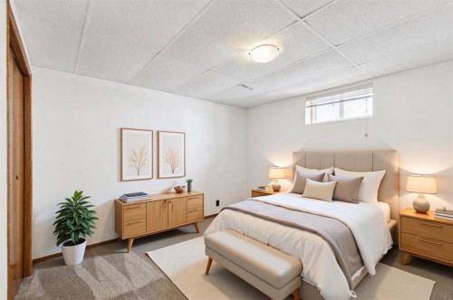 145 Alpine Crescent Se, Airdrie, AB - Indoor Photo Showing Bedroom