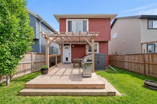 39 Heritage Boulevard, Cochrane, AB - Outdoor With Deck Patio Veranda With Exterior