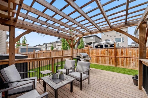 39 Heritage Boulevard, Cochrane, AB - Outdoor With Deck Patio Veranda With Exterior